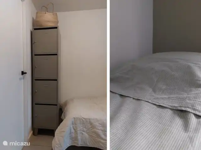 Oudveluwe - cabaña - bosque en Países Bajos, Güeldres, Voorthuizen - casa vacacional El armario y una cama hecha en la pequeña habitación