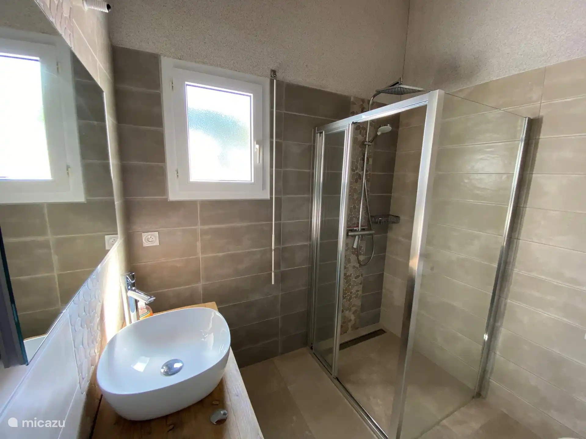 bathroom with rain shower