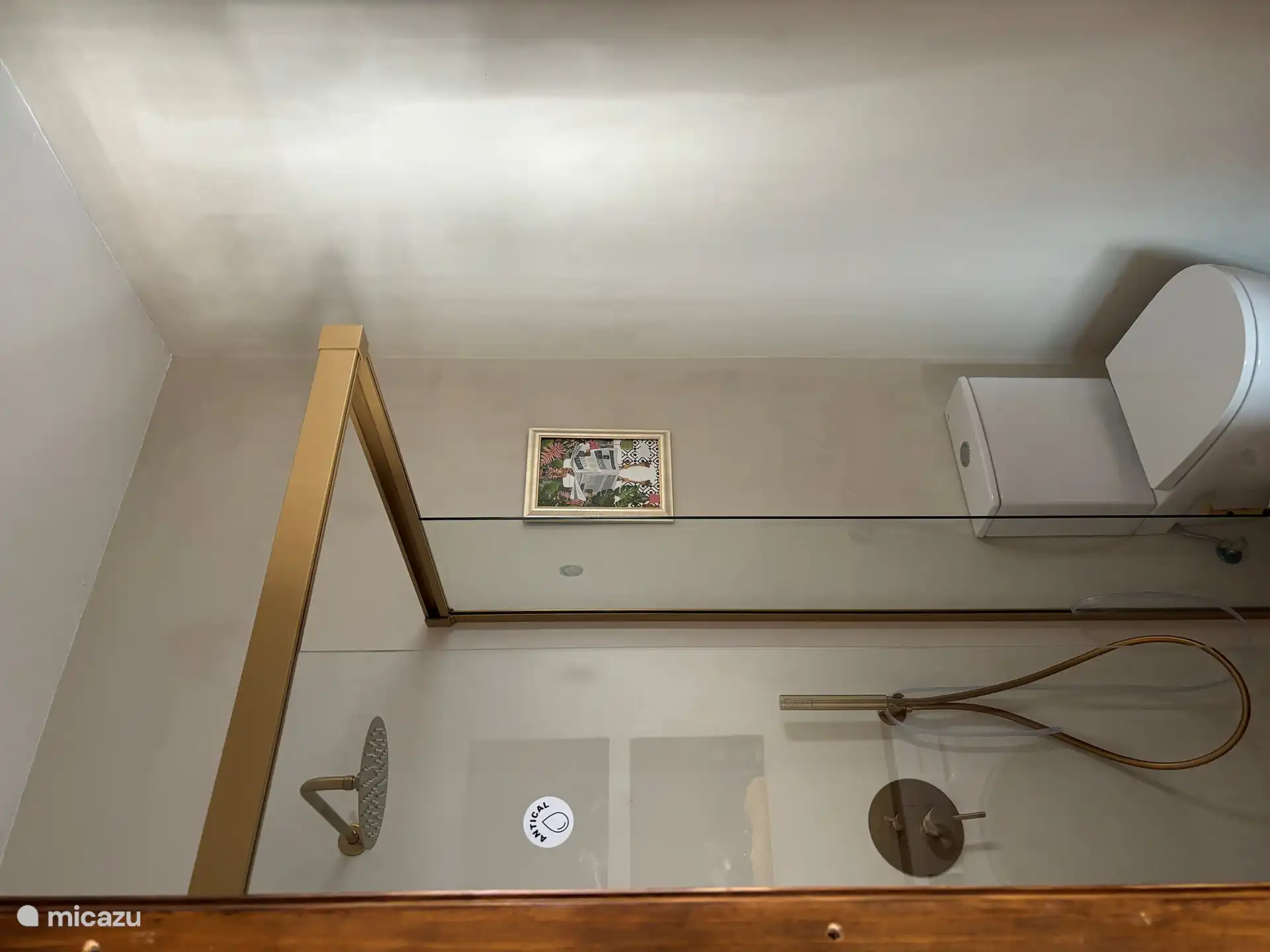 Shower room. The washing machine is located here.