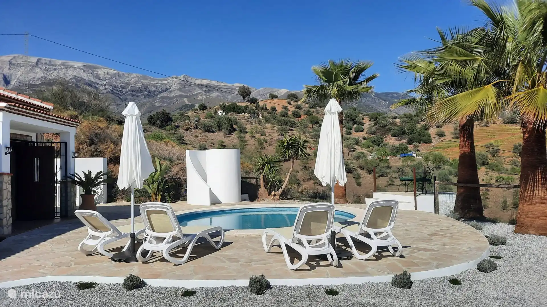 View over the pool terrace to Mount Maroma.