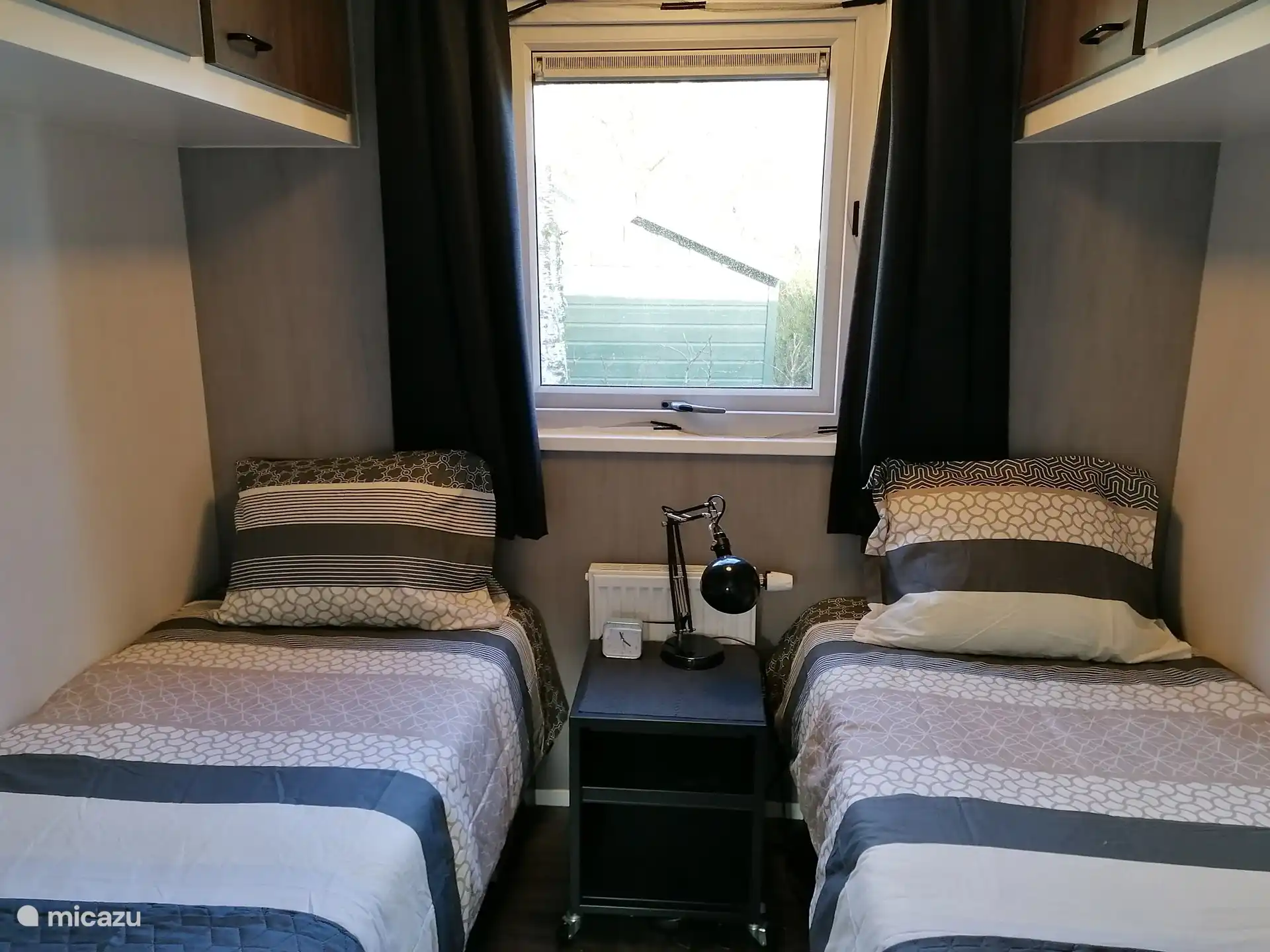 Slaapkamer met 2 éénpersoons beden (0,80 x 2,00 meter) 