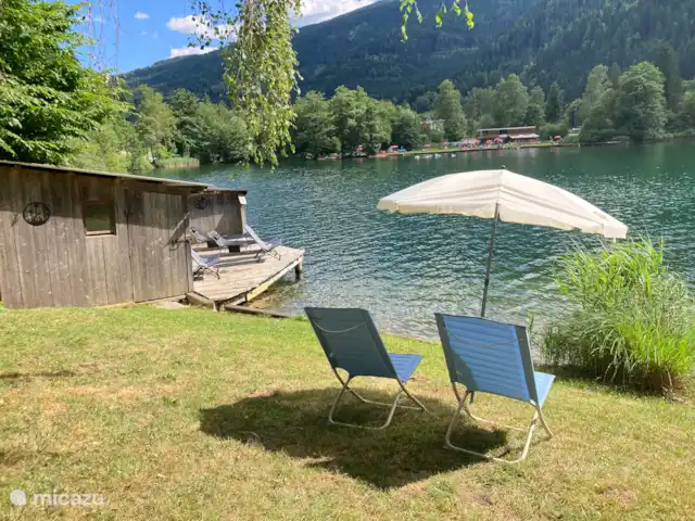 Appartement 1 slaapkamer & balkon 24 huren in Oostenrijk, Karinthië, Feld Am See - appartement Prive strand voor onze gasten, gratis gebruik van SUPs en de stoelen.