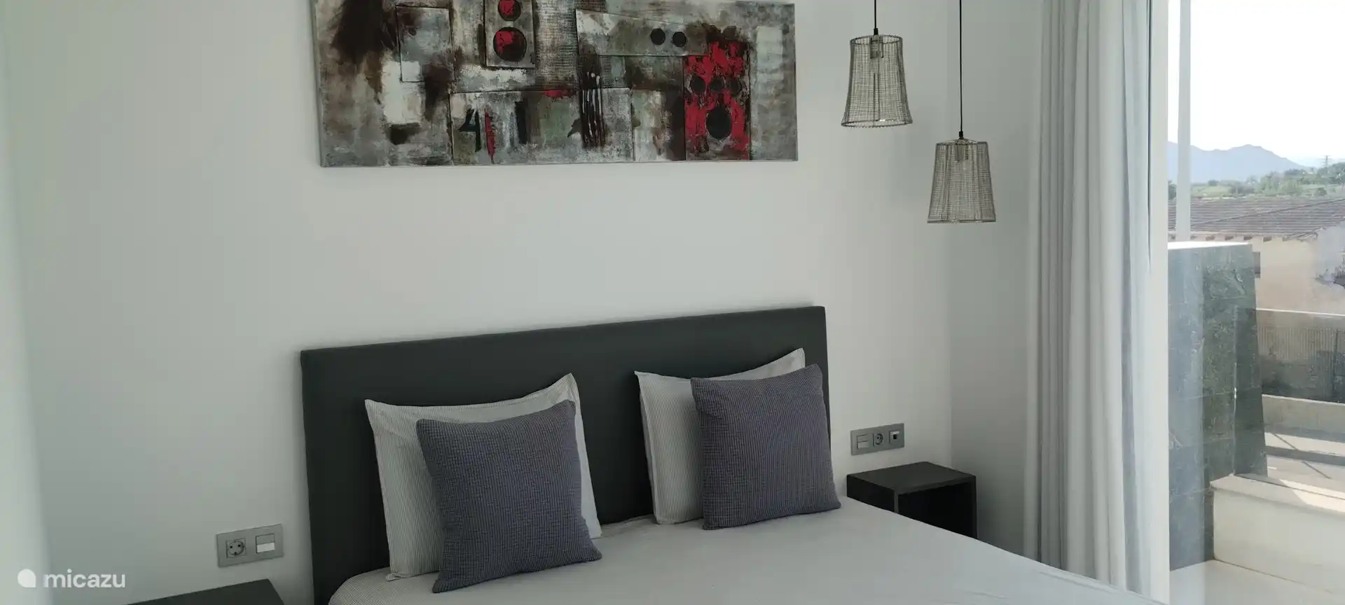 Schlafzimmer mit Balkon