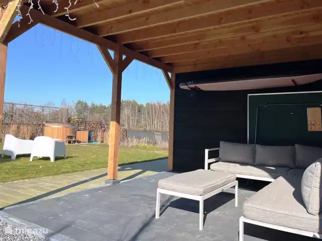 Crécerelle | Pays-Bas, Overijssel, Sibculo - maison de vacances Terrasse couverte à l’arrière avec ensemble de salon.
Il y a aussi une table de ping-pong (dépliable) et un