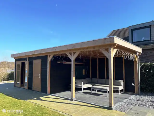 Crécerelle | Pays-Bas, Overijssel, Sibculo - maison de vacances Terrasse couverte avec salon ensemble. Table de ping-pong (pliante) et de sup. À côté se trouve le sauna