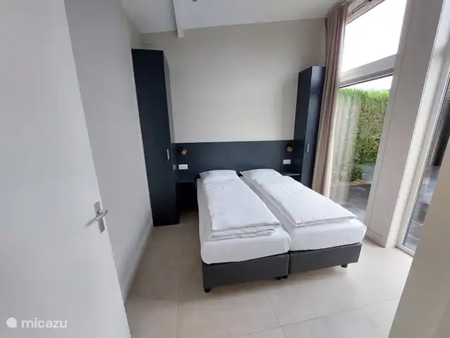 Bungalow confort con jacuzzi 01 en Países Bajos, Güeldres, Putten - casa vacacional Dormitorio 2, con 2 somieres individuales