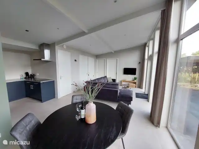 Bungalow confort con jacuzzi 01 en Países Bajos, Güeldres, Putten - casa vacacional Acogedora sala de estar