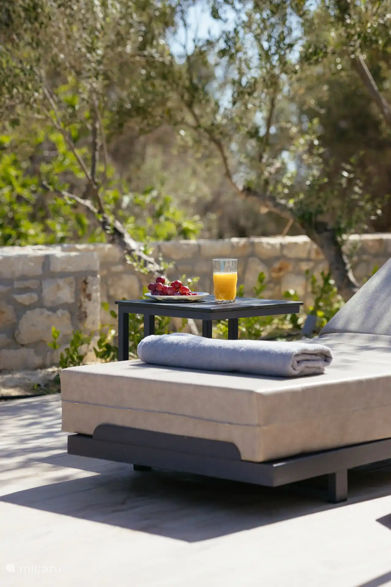 Comfortable loungers around the pool