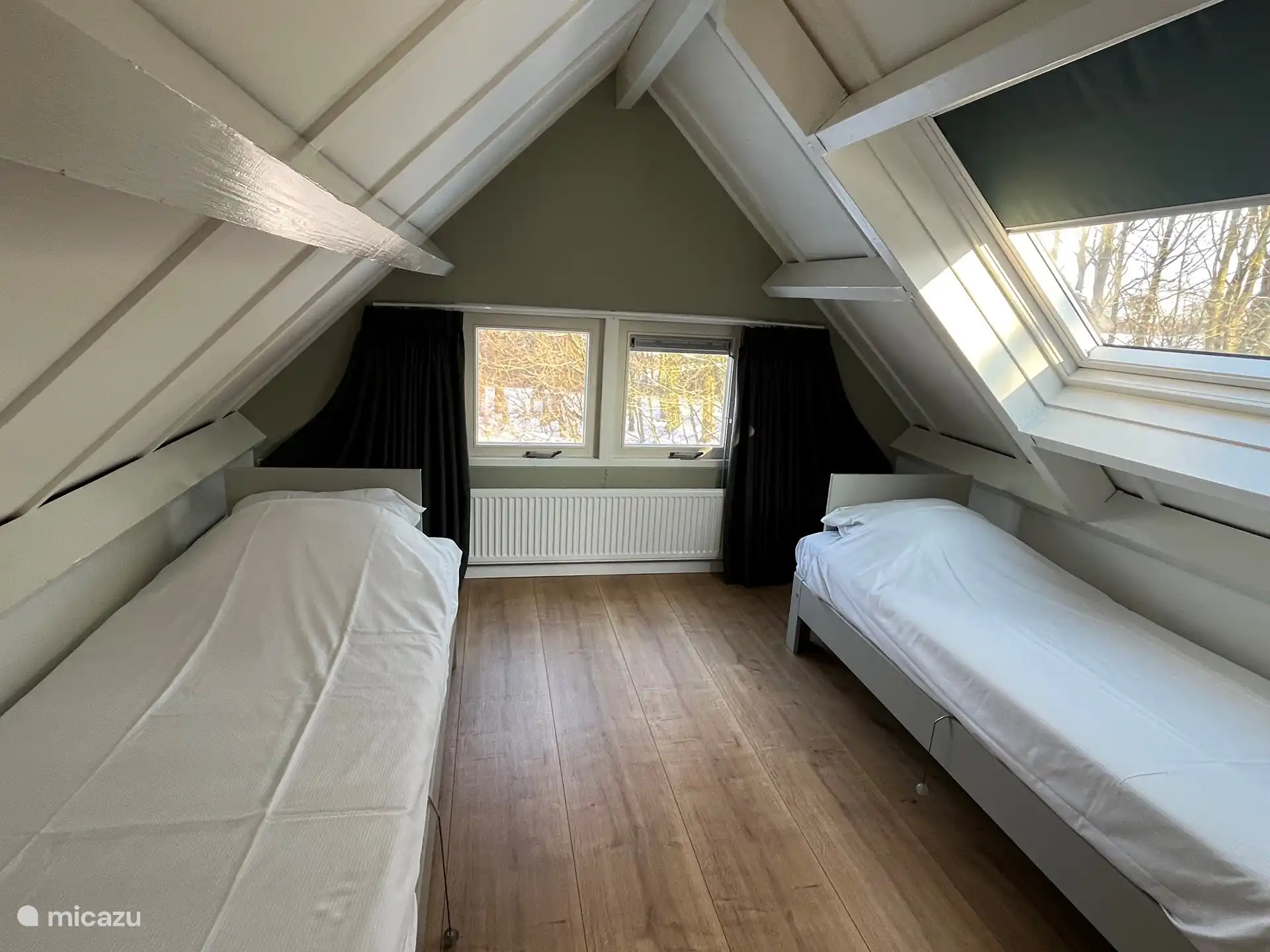 Another photo of the same bedroom on the first floor.