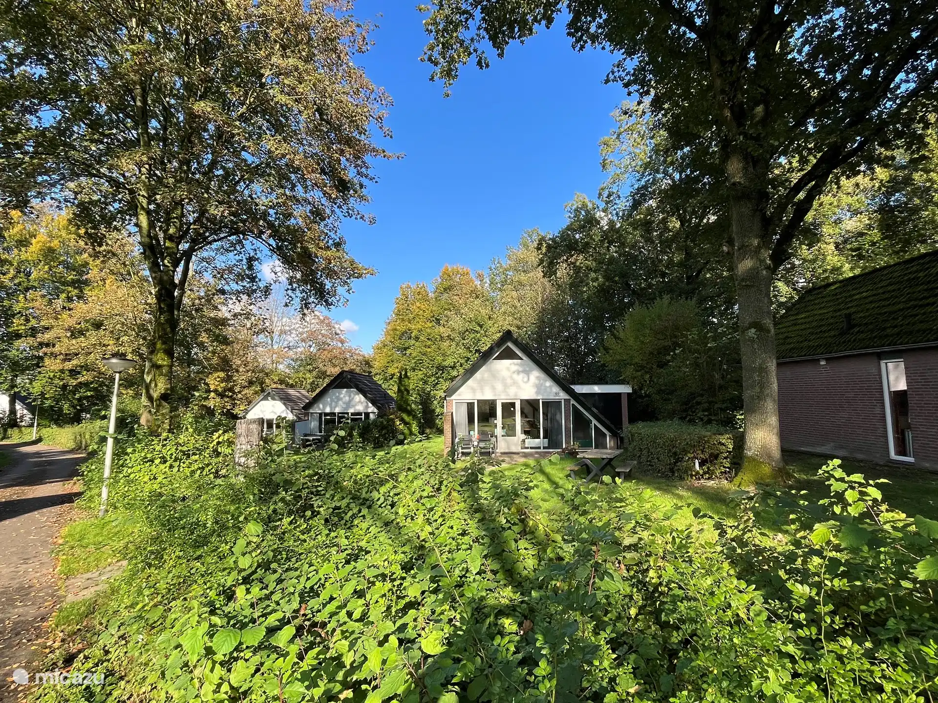 Detached and located in the green.