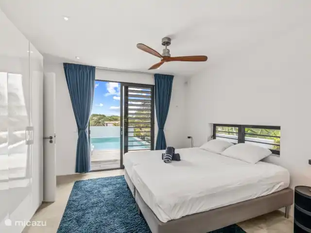 Villa Brakkeput avec vue et piscine | Curaçao, Banda Ariba (est), Brakkeput Abou - villa Chambre 1 avec accès à la piscine.