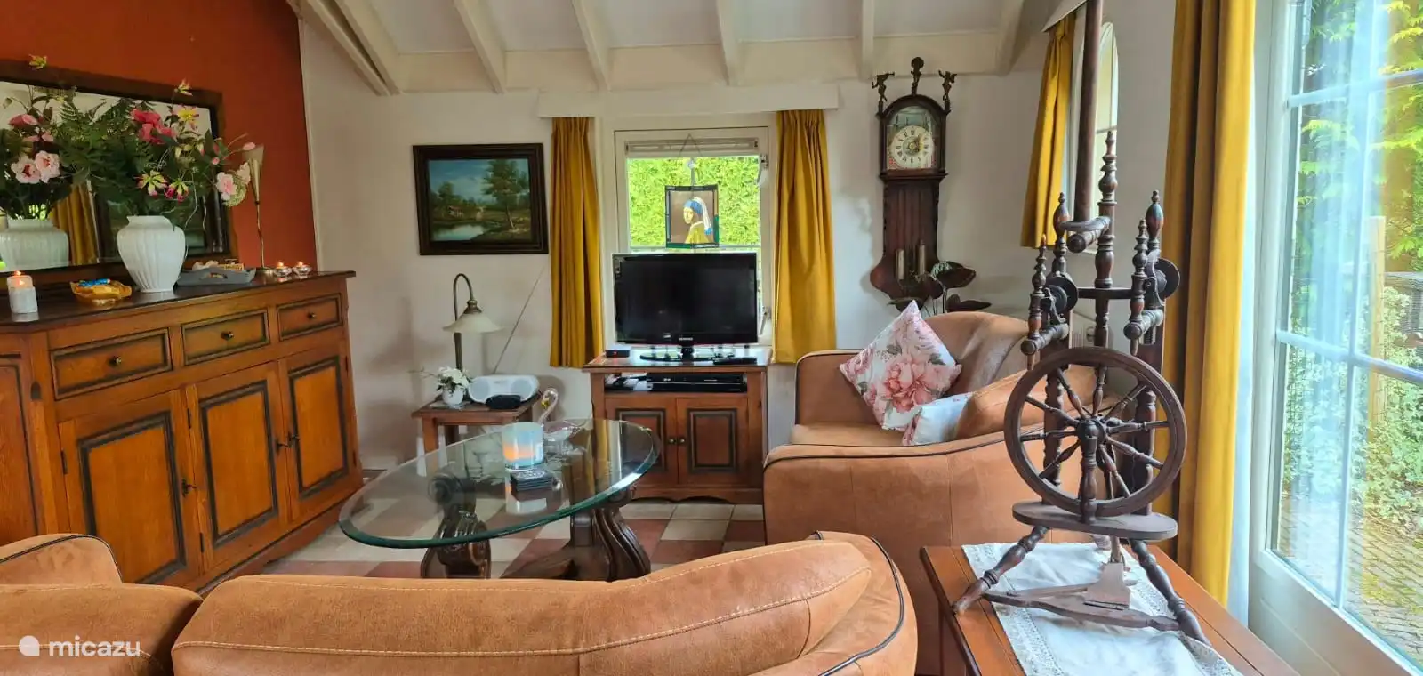 Spacious sitting area with two 2.5 seater sofas, TV and internet.