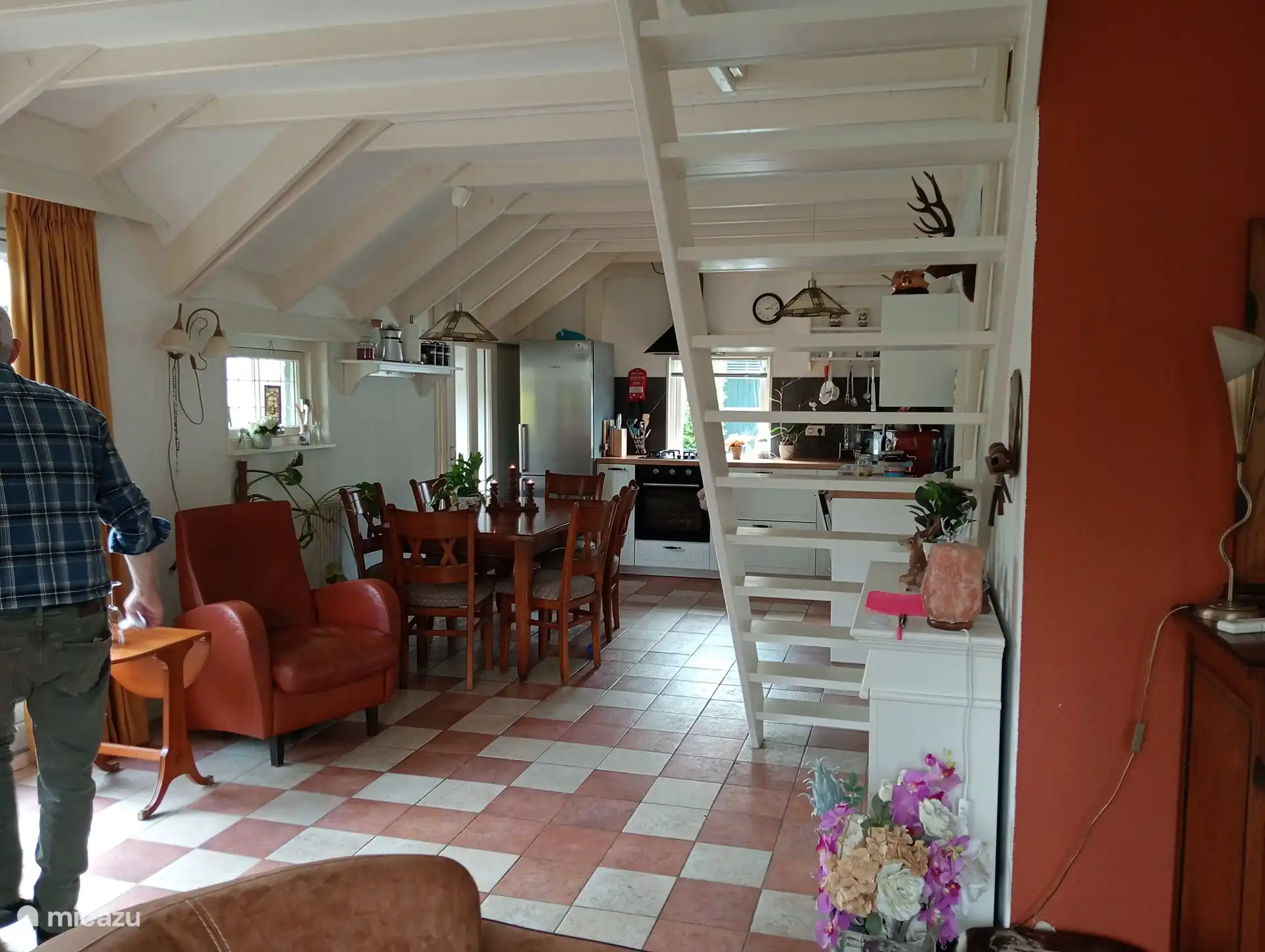 Spacious living room, sitting area and kitchen in one.