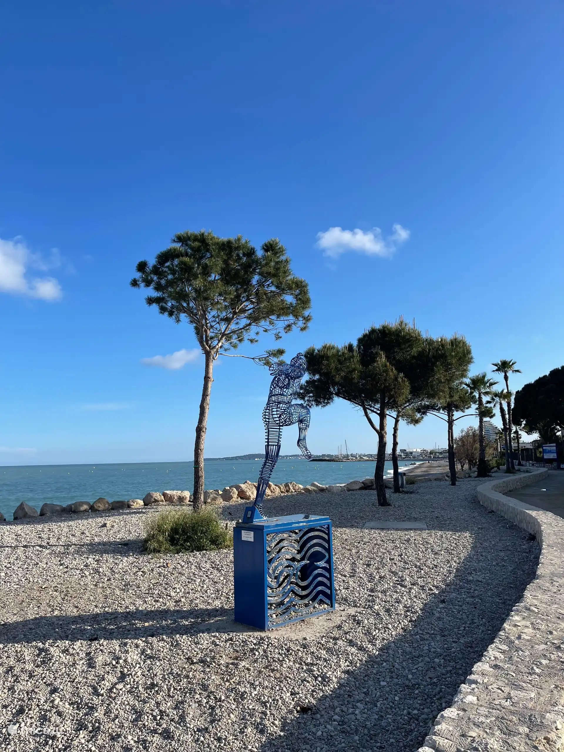 Het strand en boulevard bij ons strandhuisje