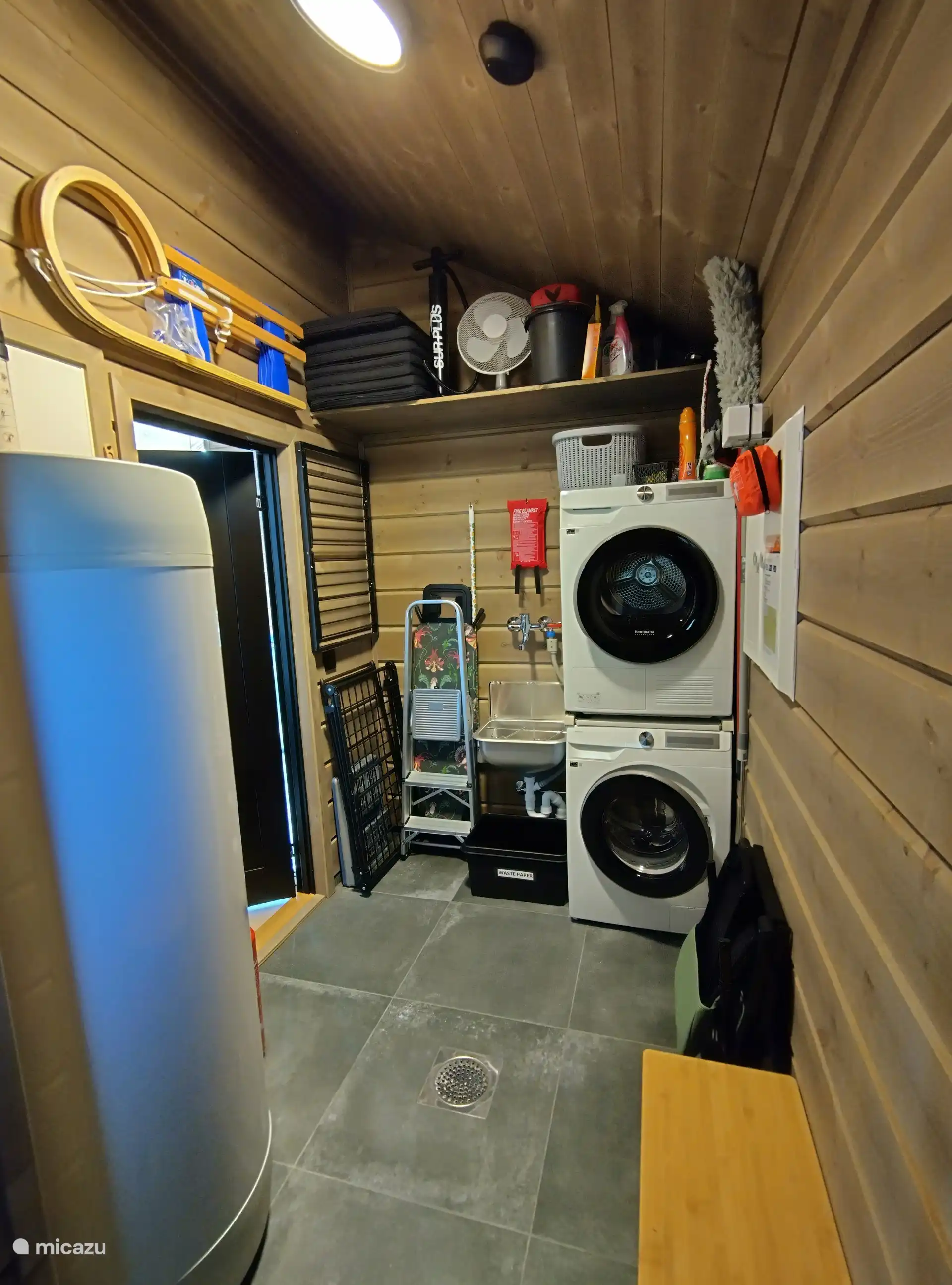 Storage room with washing machine and dryer
