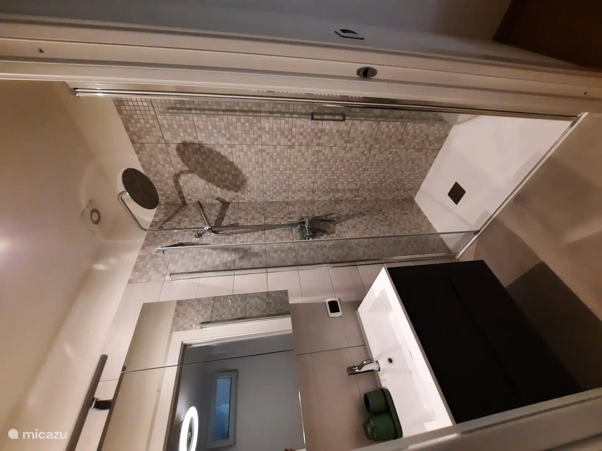 Bathroom in bedroom 2, with spacious shower, sink and toilet