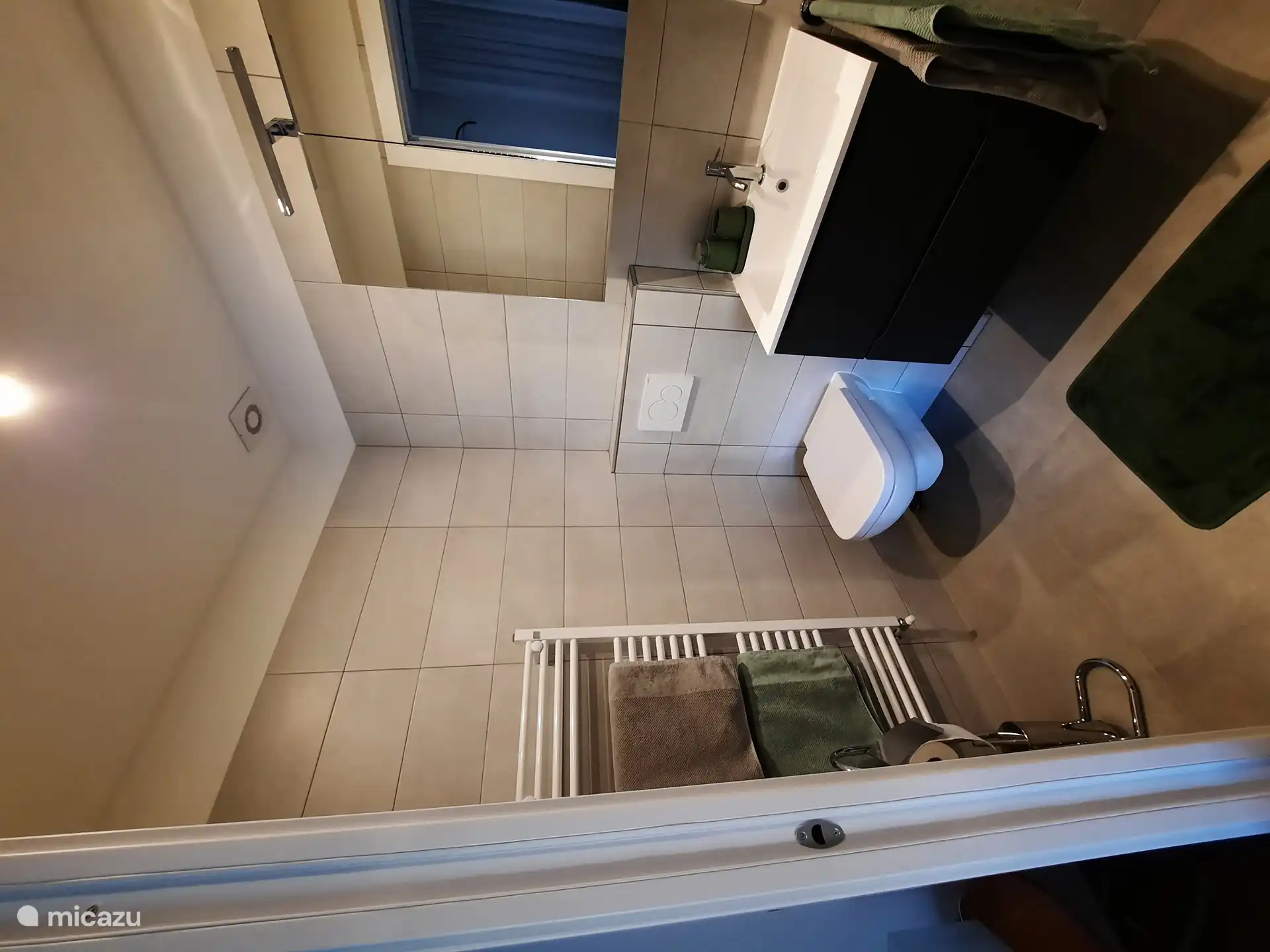 Bathroom in bedroom 1, with sink, toilet and spacious shower