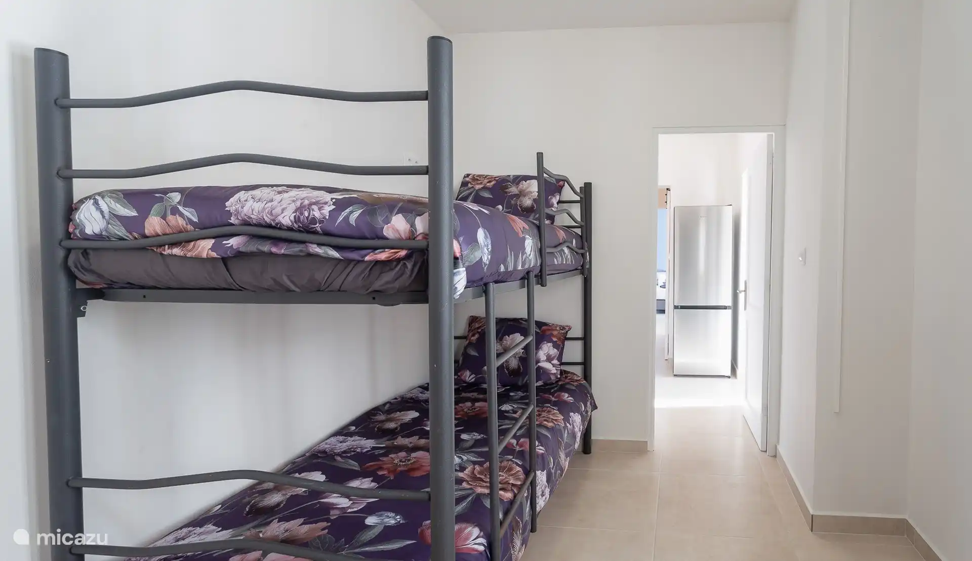 La chambre des enfants dispose d’un lit superposé