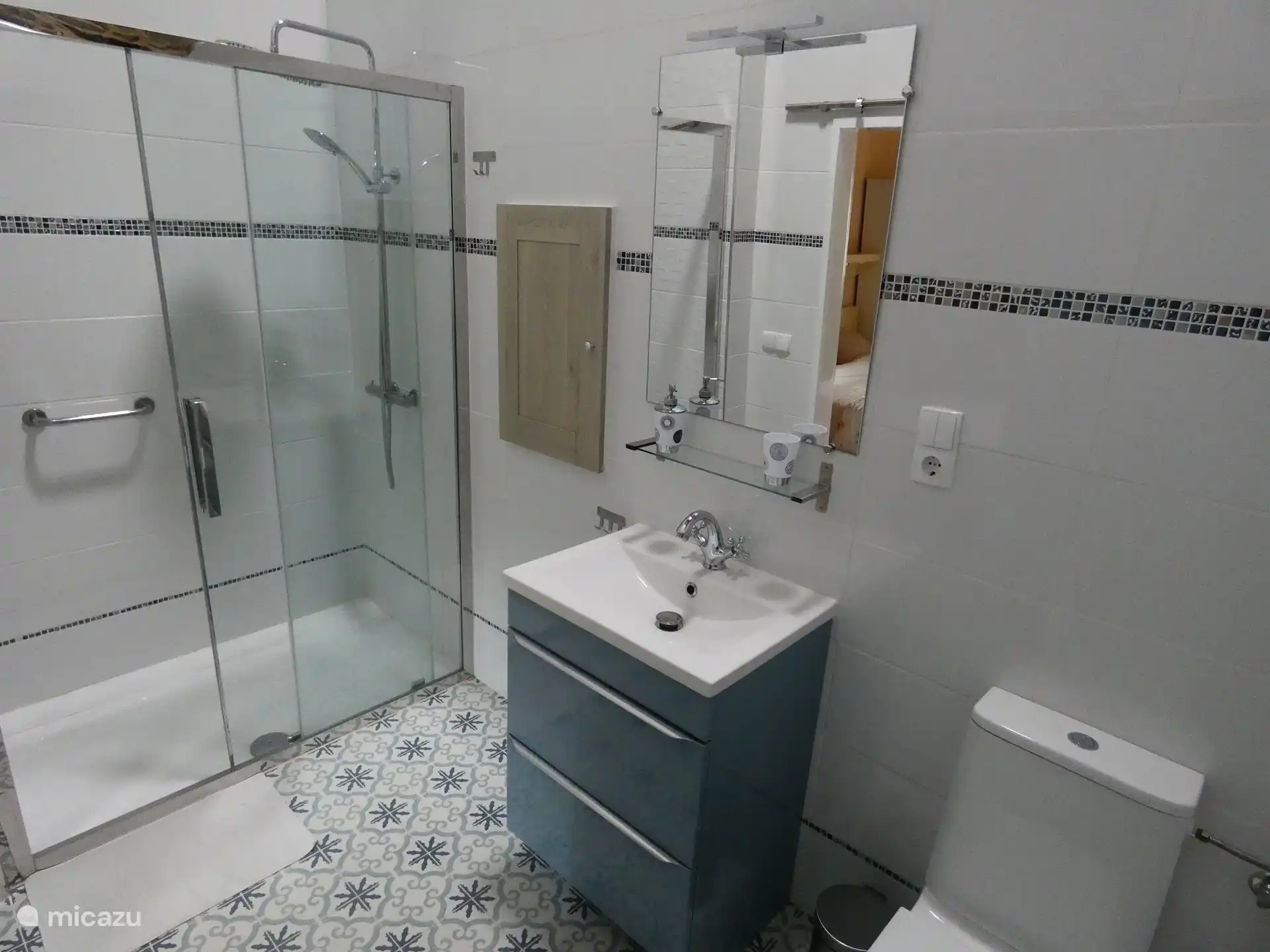 This bathroom is en-suite with the bedroom at the front