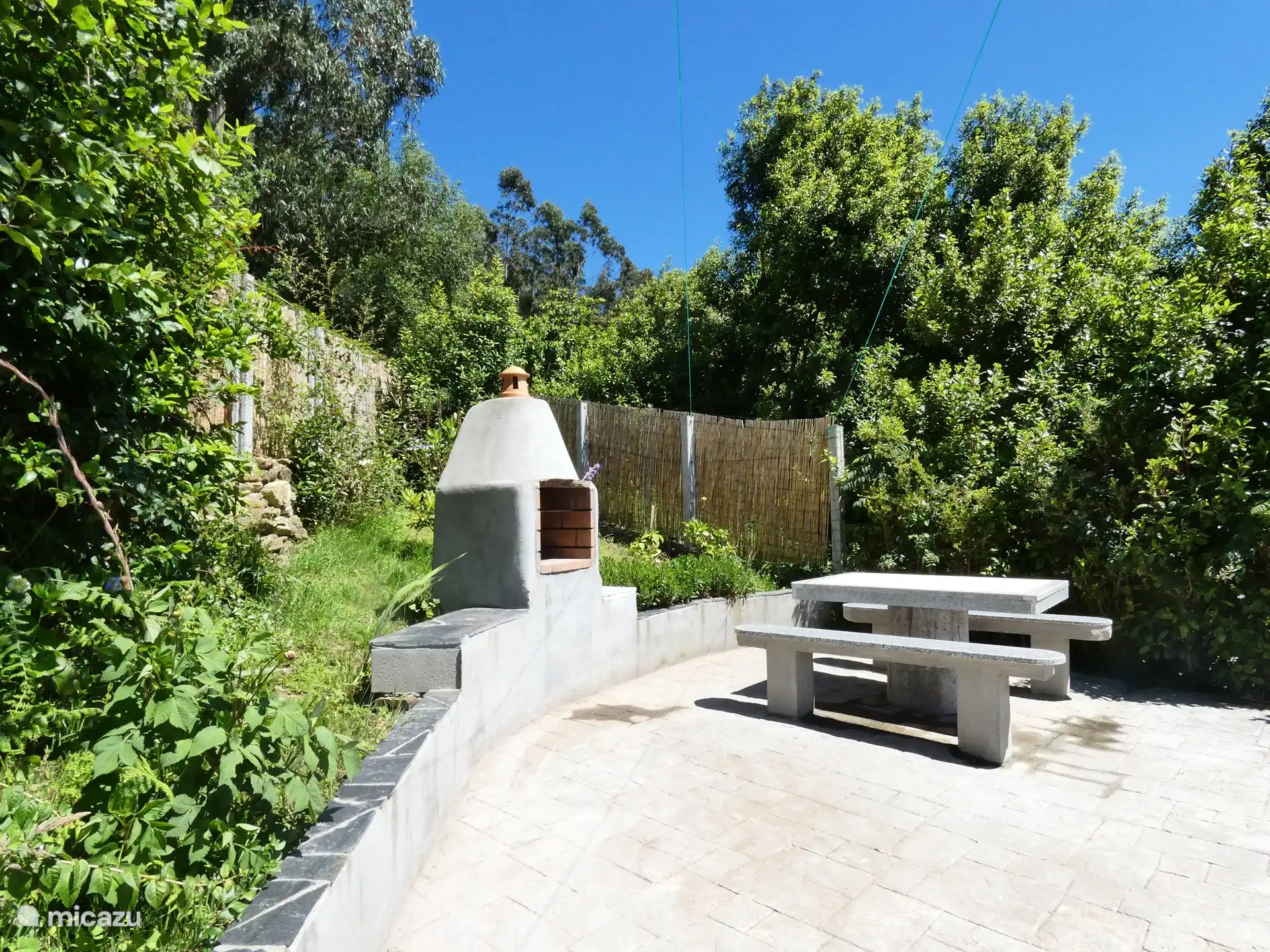 The bbq on the high terrace in the garden