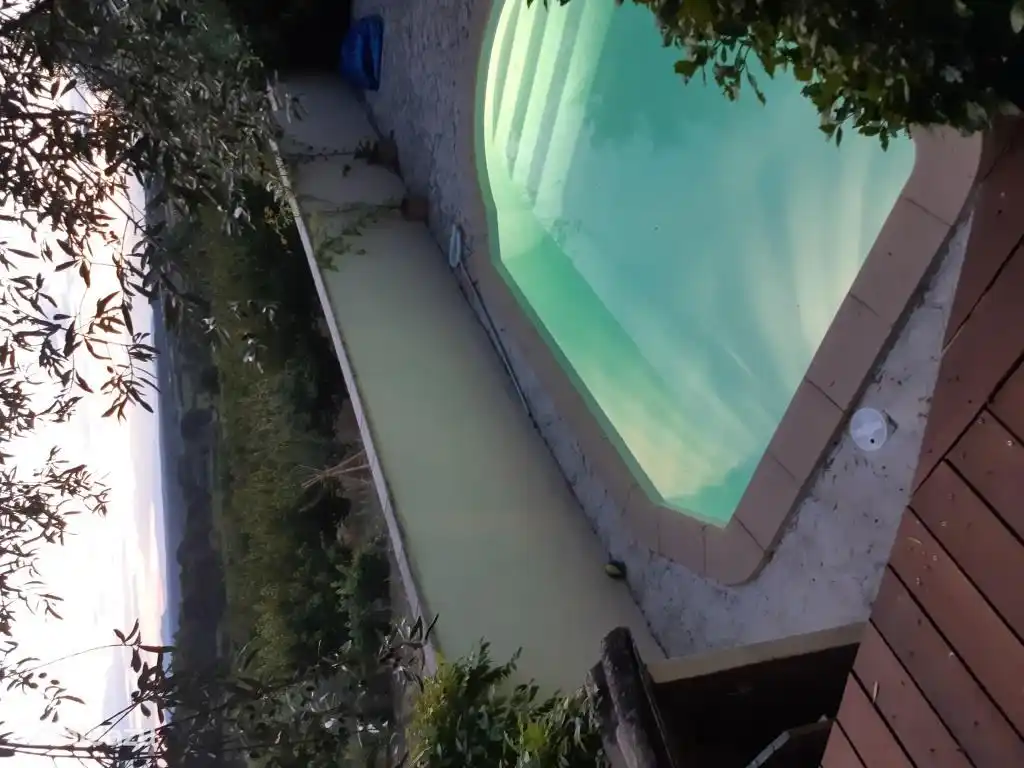 Illuminated swimming pool