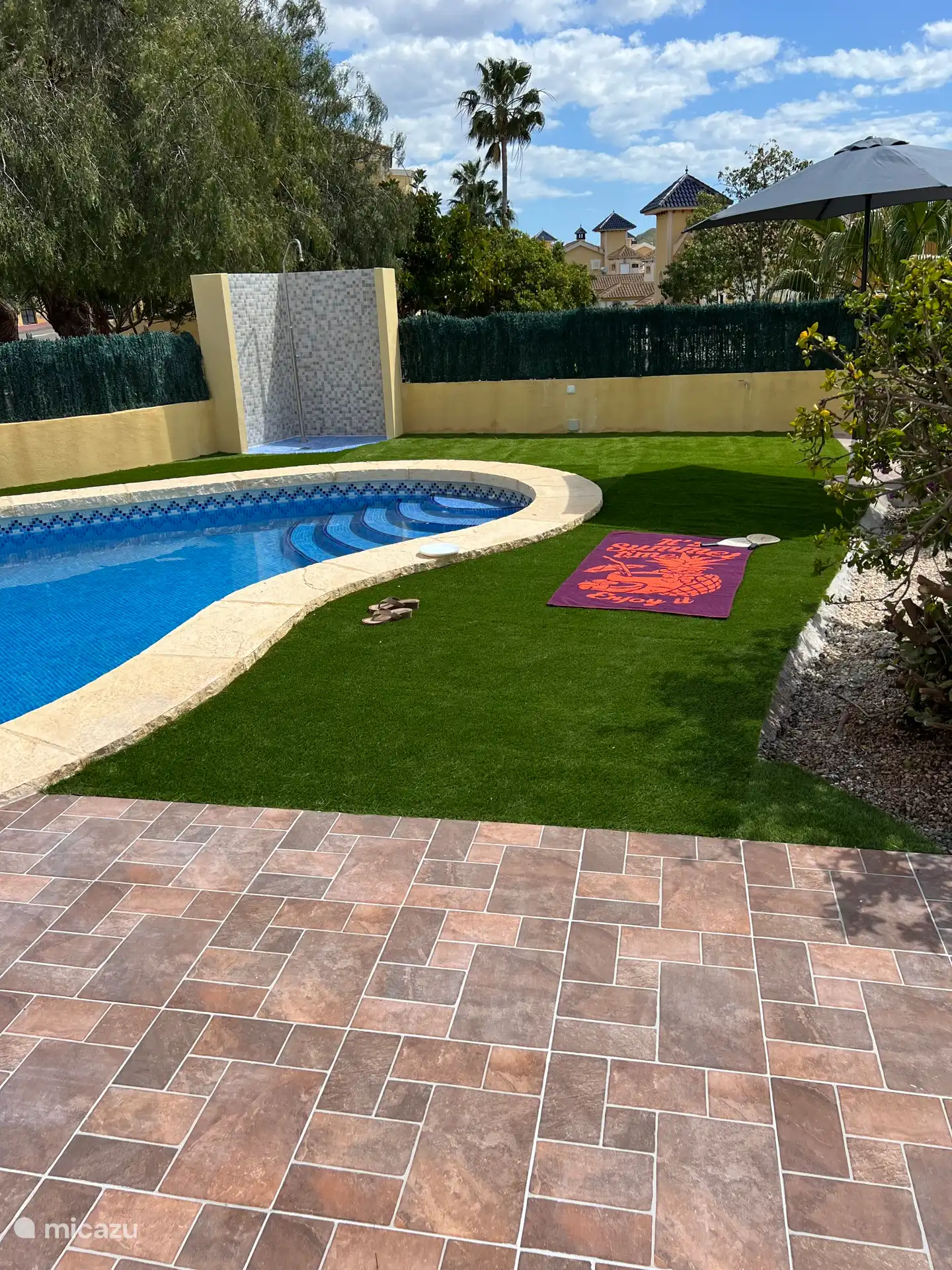 swimming pool with outdoor shower