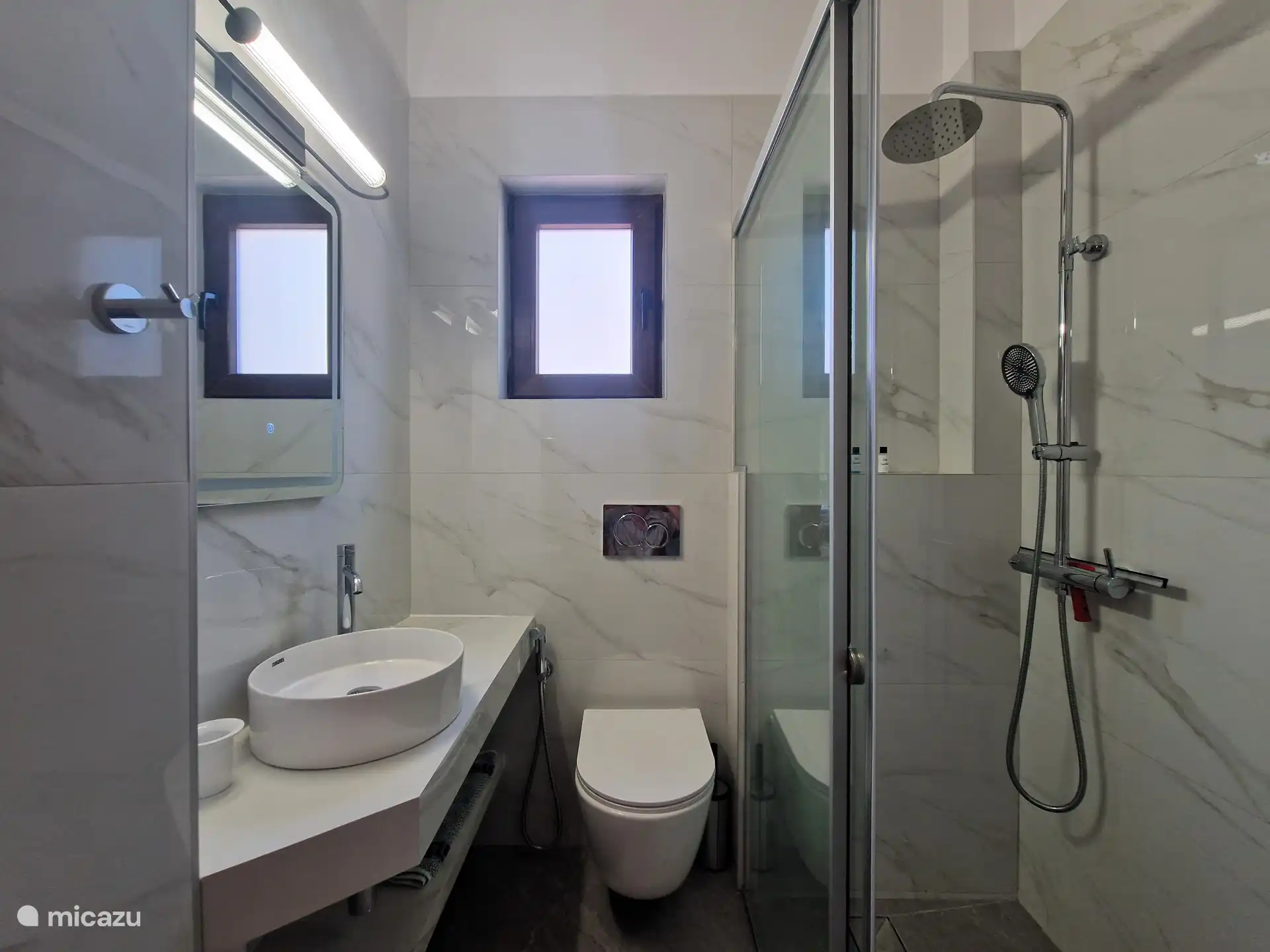 De badkamer