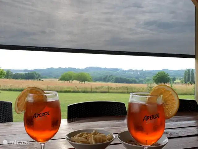 Trémouille en Francia, Dordoña, Saint-Geniès - casa vacacional Terraza lado oeste con mamparas