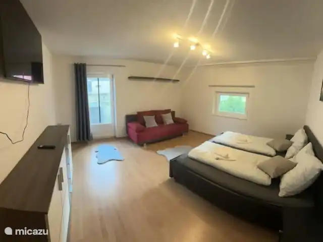 Location de Vacances Autriche, Tyrol, Radfeld, maison de vacances - Maison d’hôtes Inntal Lit double avec canapé-lit et balcon