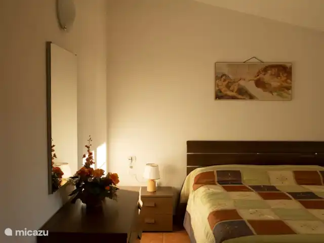 Il Melograno, tussen heuvels en zee huren in Italië, Toscane, Guardistallo - appartement Slaapkamer met tweepersoonsbed 1