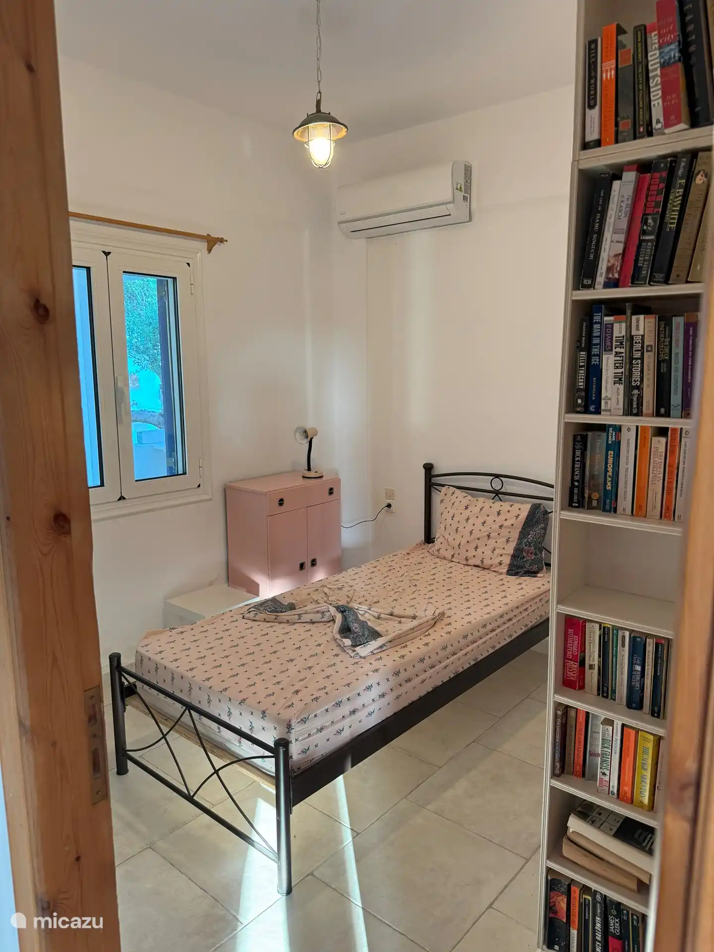 Eenpersoons slaapkamer op de begane grond