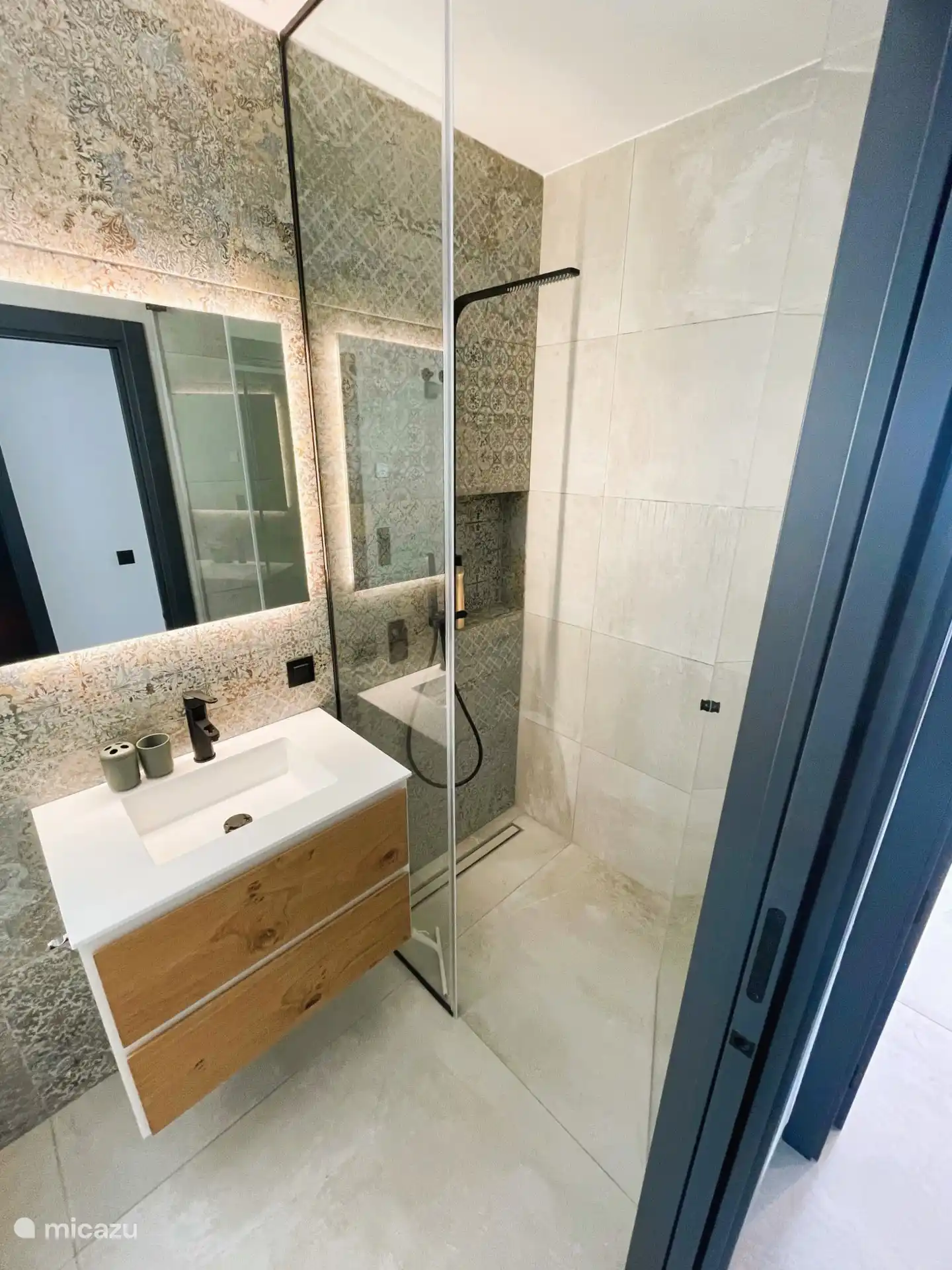 2nd bathroom modern, with LED lighting. spacious shower, sink and toilet