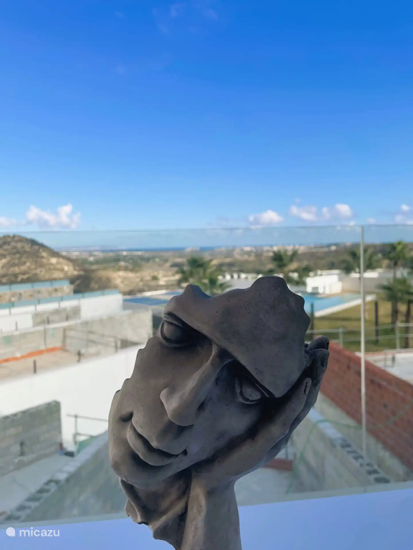 Atmospheric photo stylish interior Casa Vista Mar with the sea in the distance