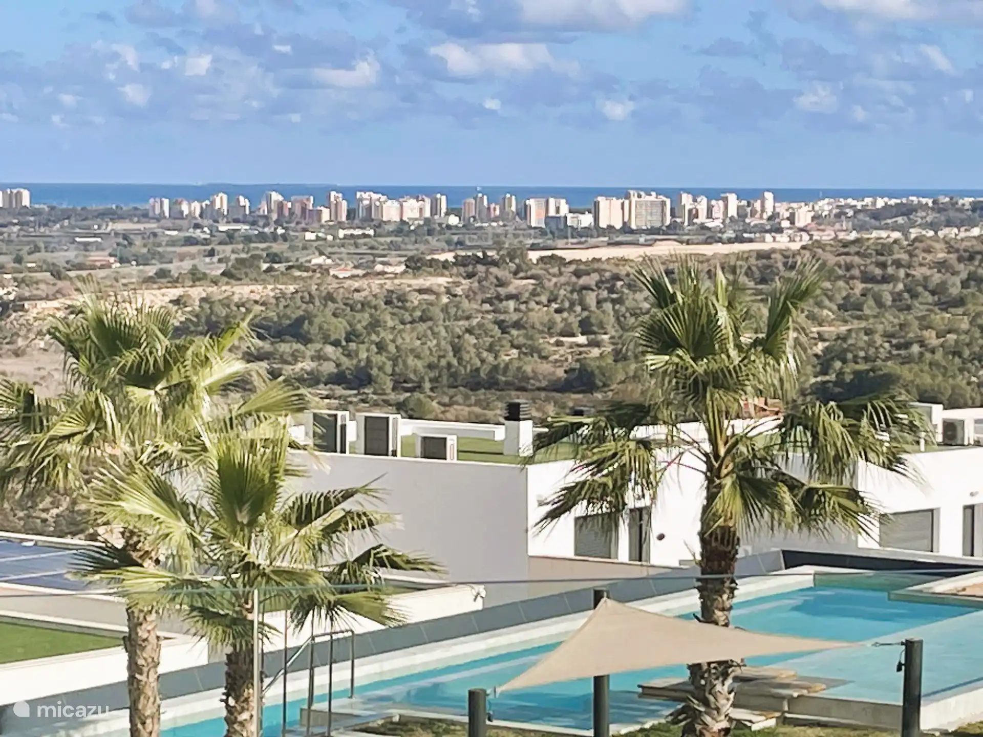 The skyline of Guardamar del Segura with the sea