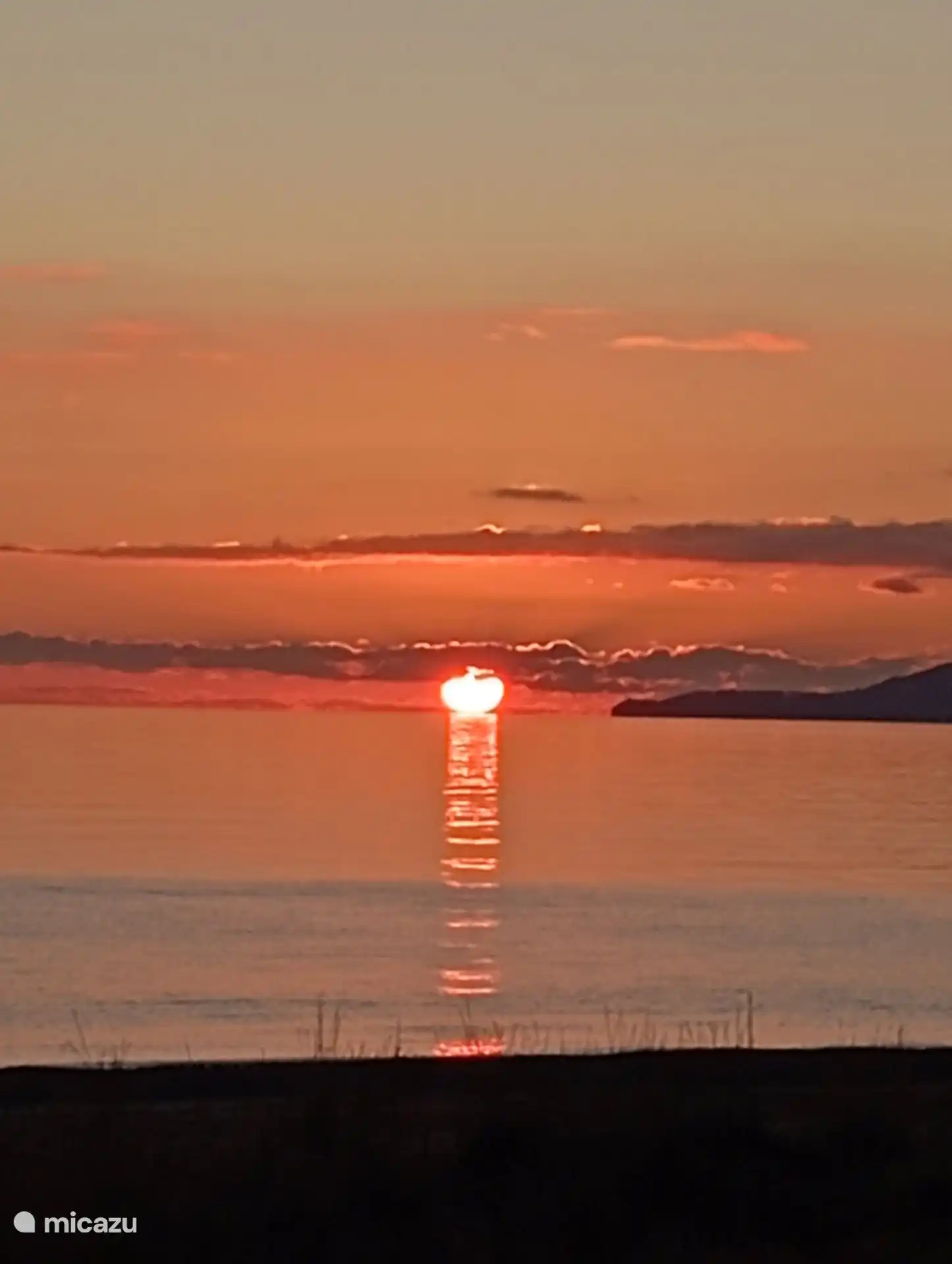 Schlafzimmer für bis zu 4 Personen mit Holzstruktur und Meerblick