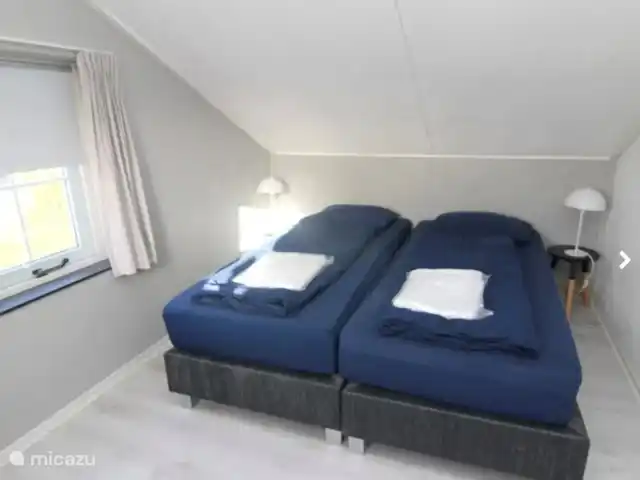 Parque de vacaciones de Krim. 724. en Países Bajos, Texel, De Cocksdorp - casa vacacional Dormitorio primer piso.