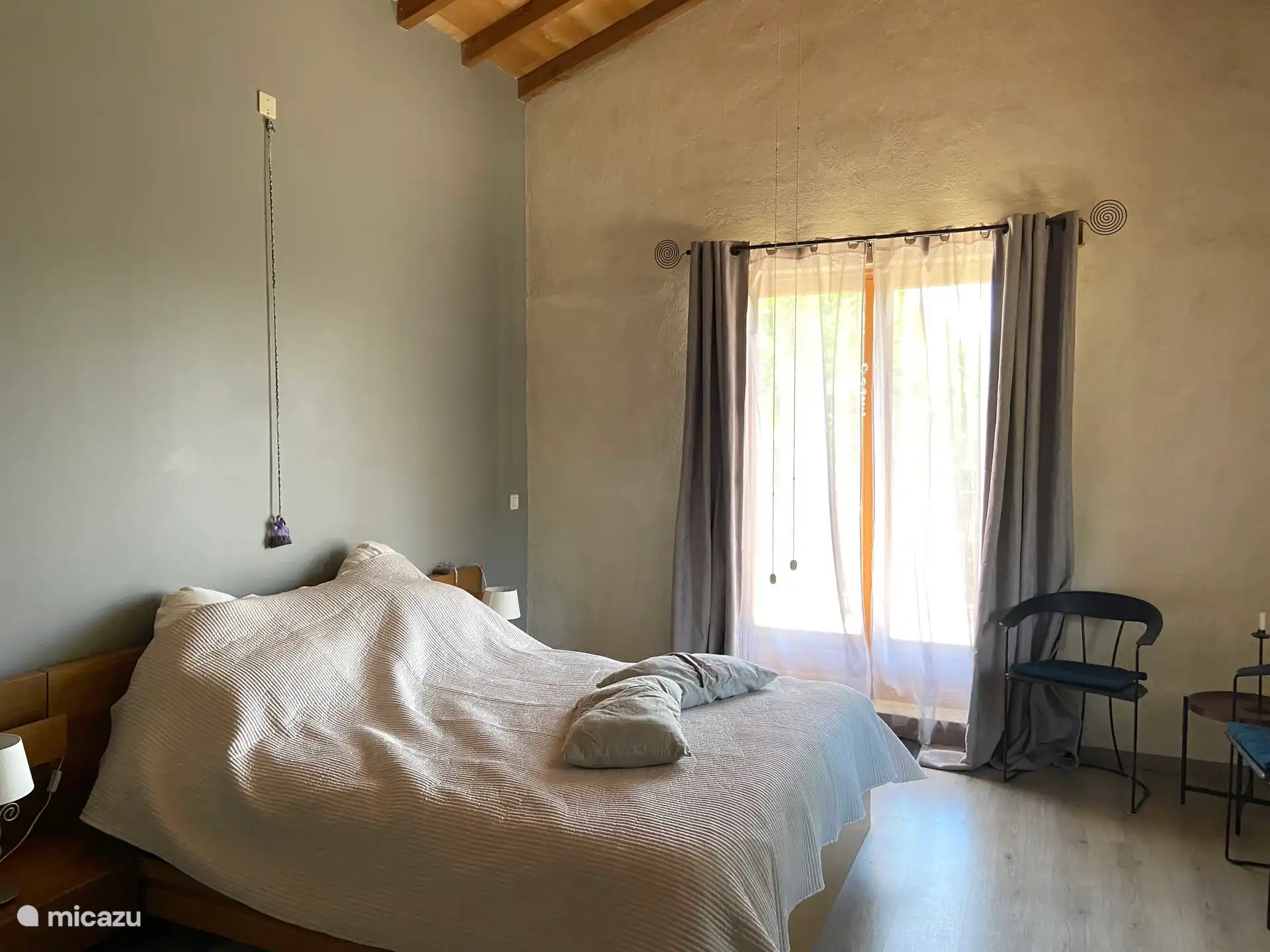 Master bedroom with patio doors to terrace