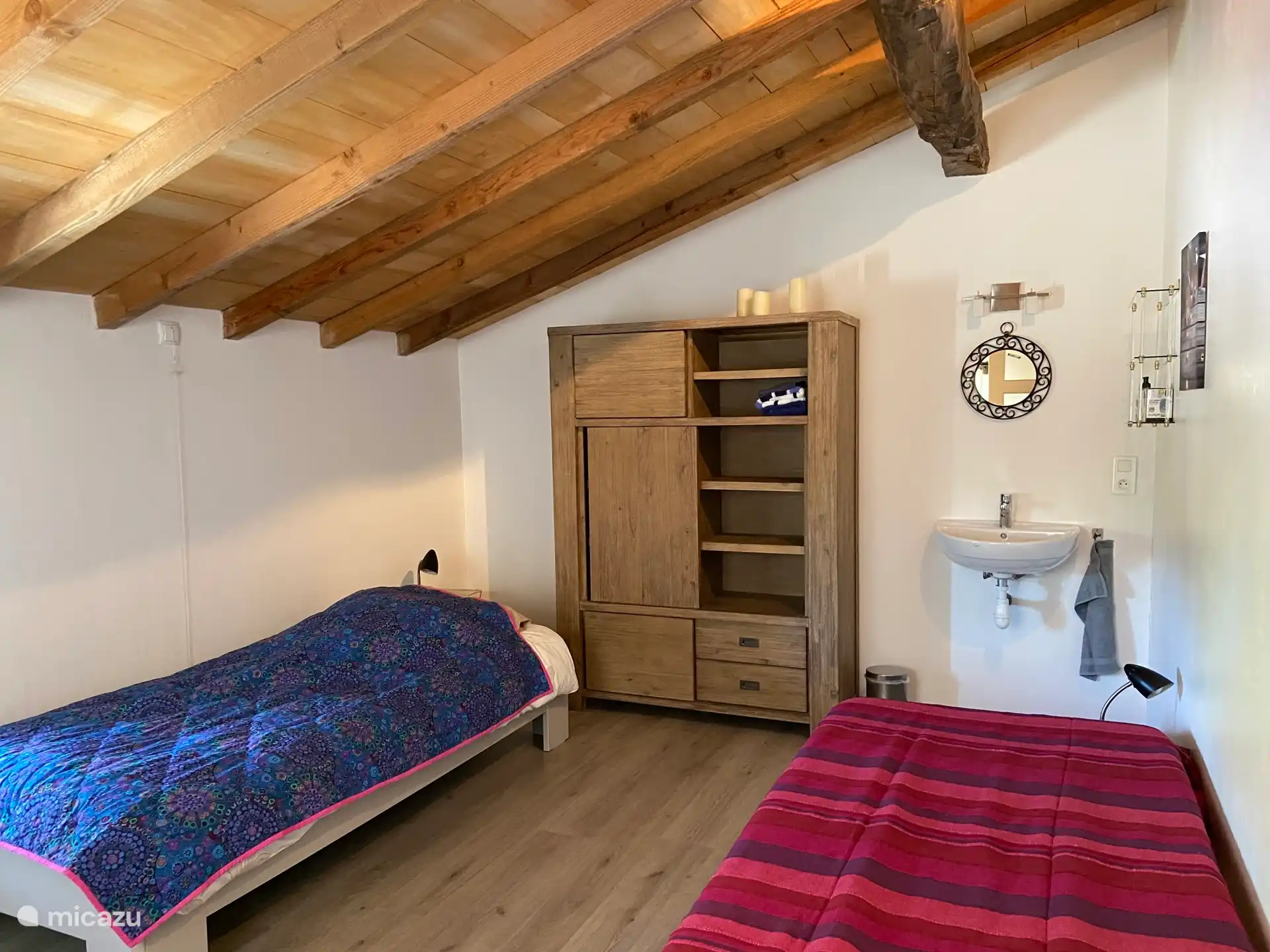 3rd bedroom with 2 beds and sink