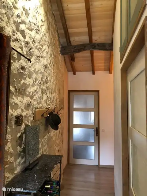 Hallway to the bedrooms and on the right is the bathroom