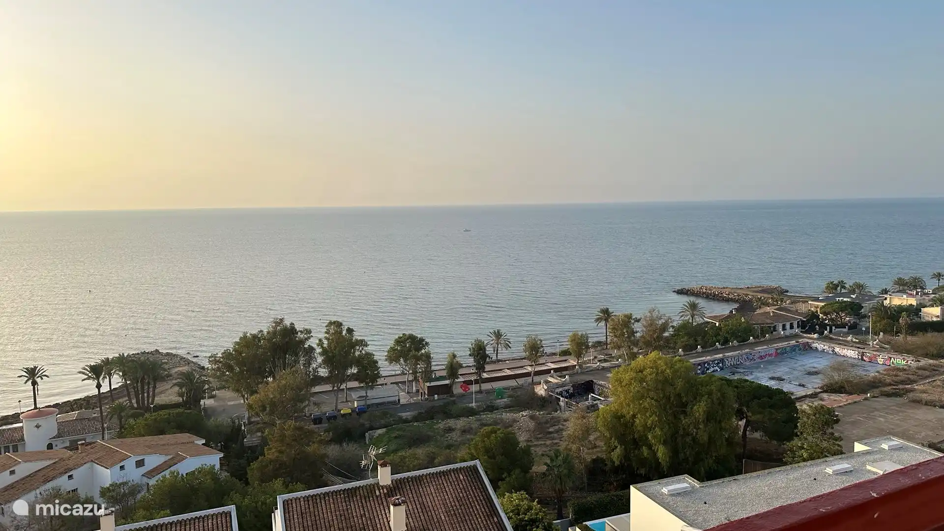 The beach and restaurants at 150 m