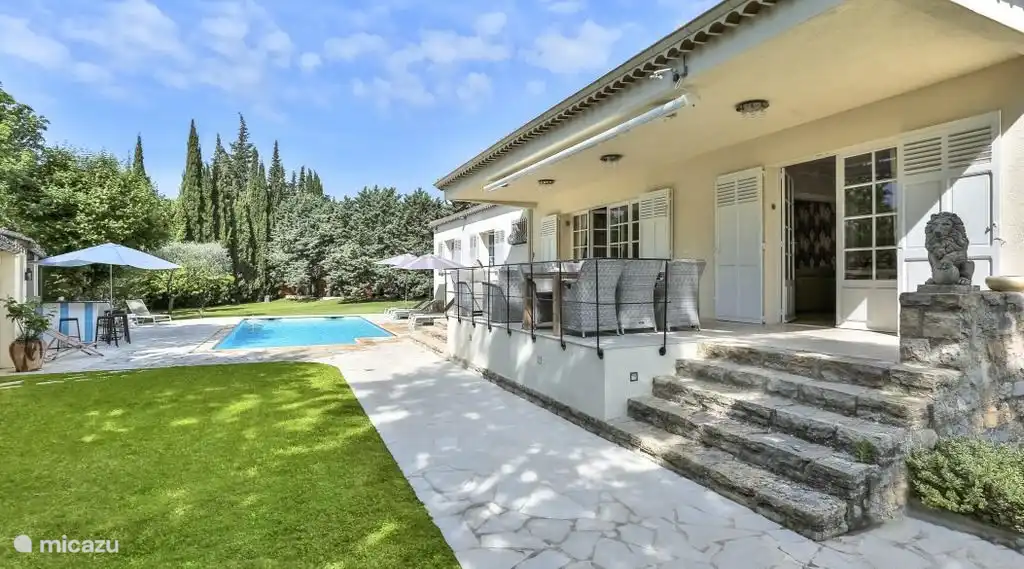 Lovely terrace with a view of the garden and the pool
