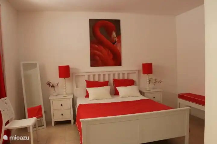 bedroom red with ensuite bathroom