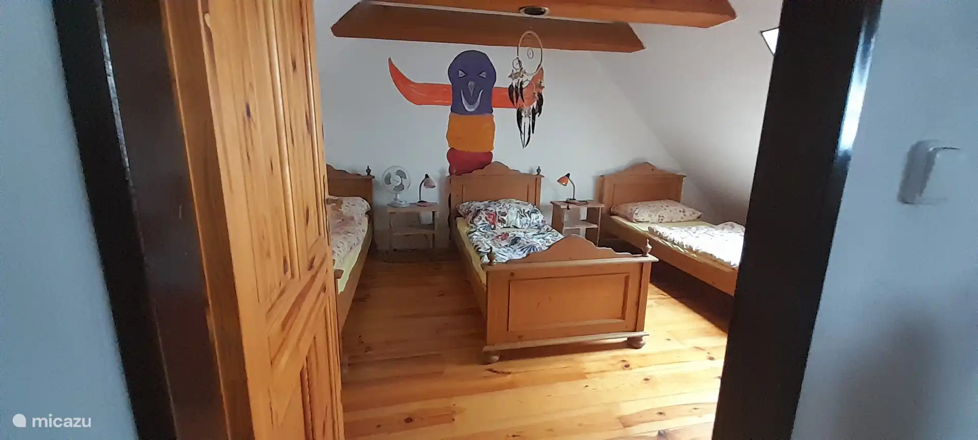 Bedroom with three single beds