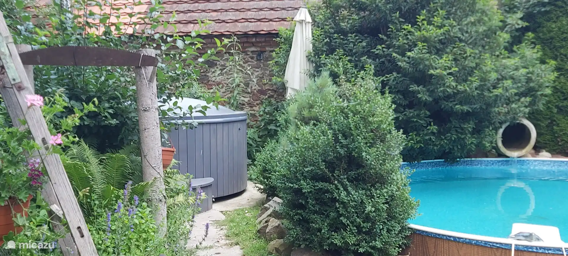 Houy-fired hot tub and swimming pool