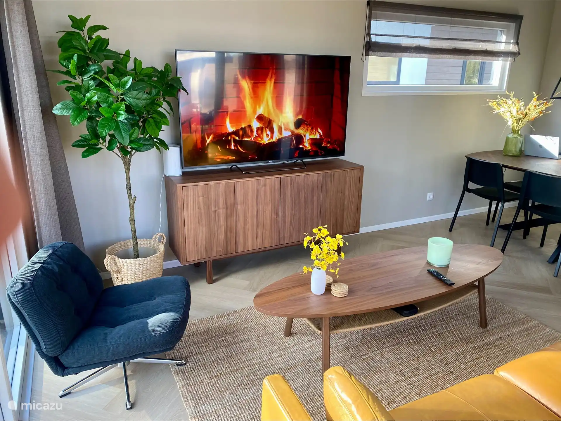 Cozy living room with large television with videoland & Prime