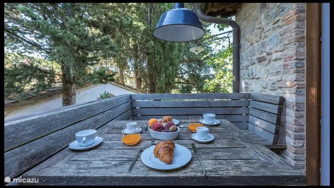 Delicious breakfast or a glass of wine on our own balcony