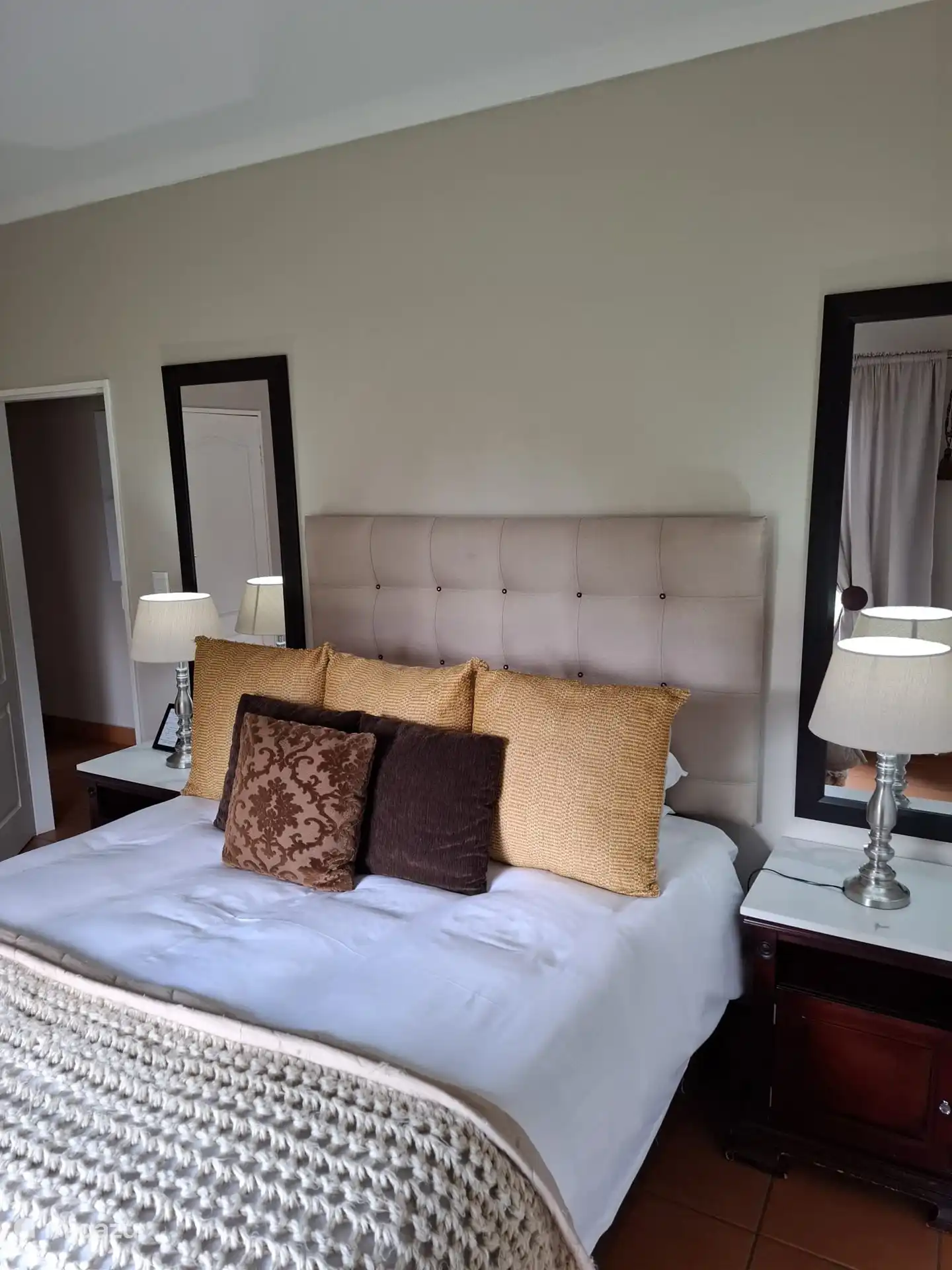 Second room with queen size bed.