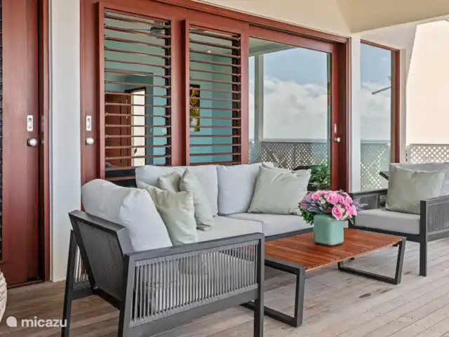 Ocean Breeze 3, BocaGentil huren in Curaçao, Banda Ariba (oost), Jan Thiel - appartement Comfortabele loungeset op het terras