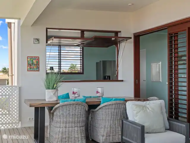 Ocean Breeze 3, BocaGentil huren in Curaçao, Banda Ariba (oost), Jan Thiel - appartement Keuken met uitzicht op het terras
