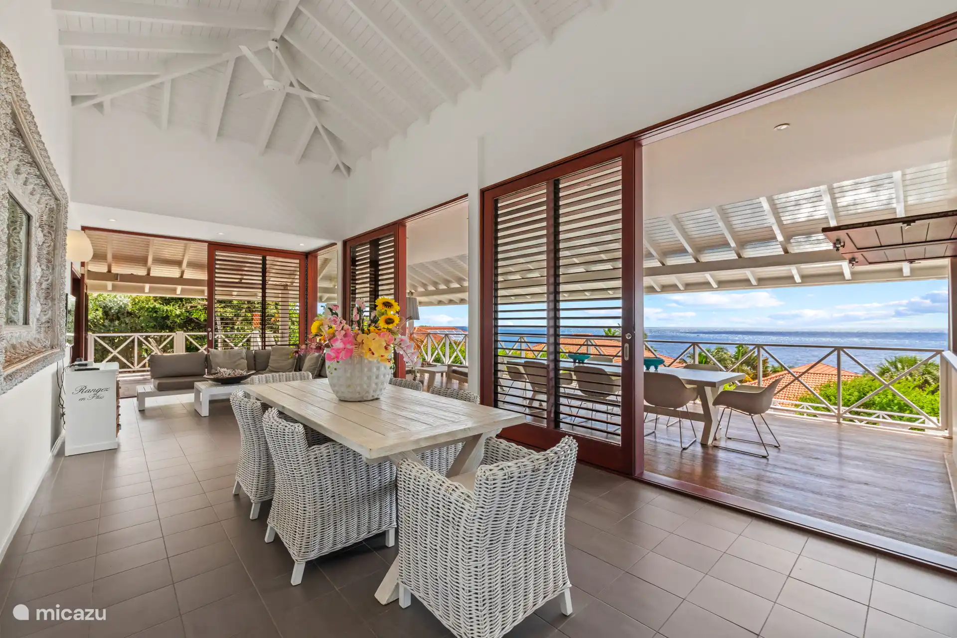 Cozy living room with sitting area and dining table